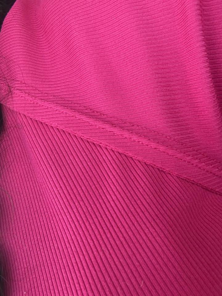 LuLaRoe Melanie Raglan Top in Solid Vibrant Fuchsia product image.