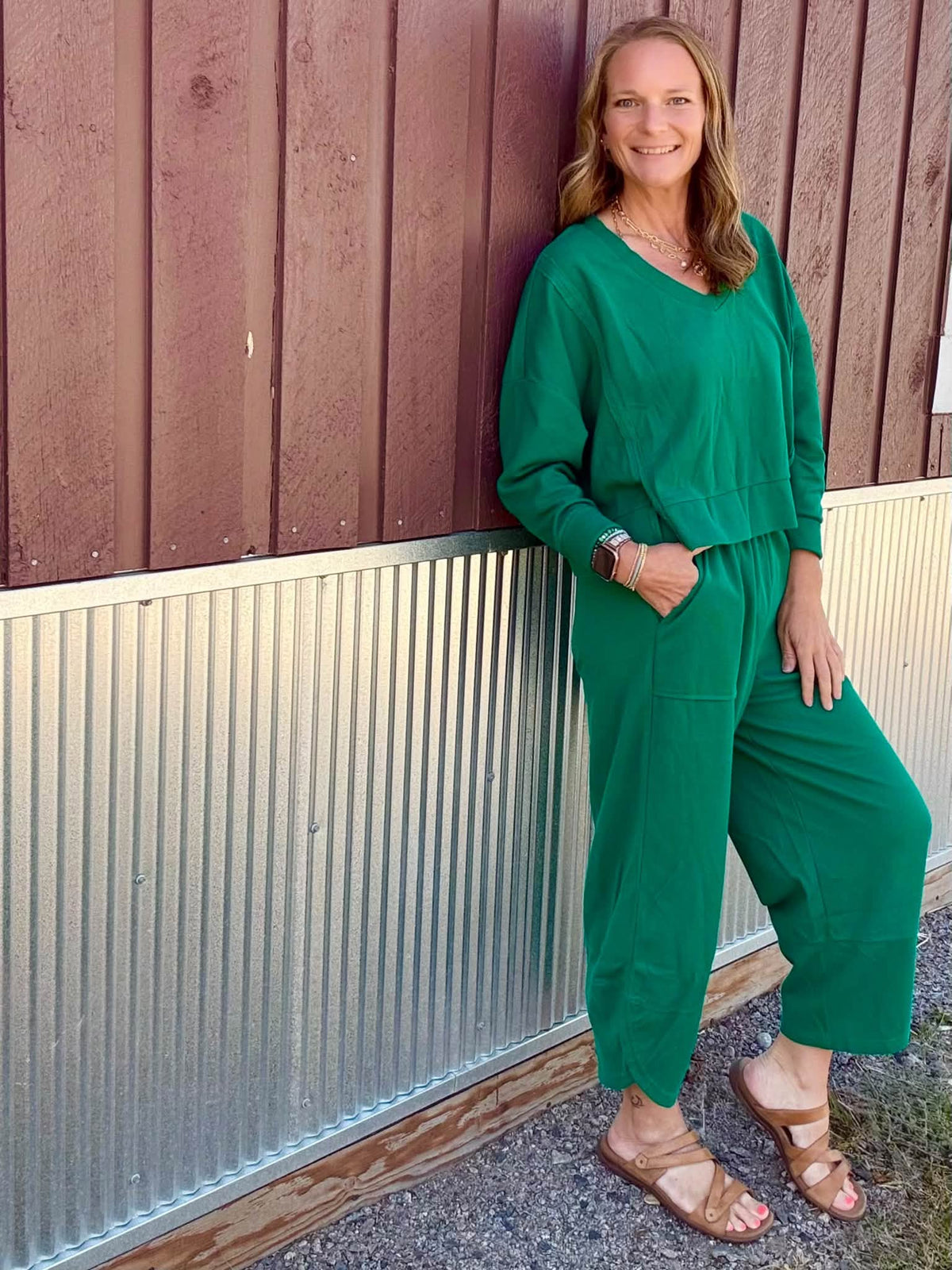 Lifestyle view 5 of the LuLaRoe Wendy Easy Barrel Pull-On Pant in Solid Emerald Green