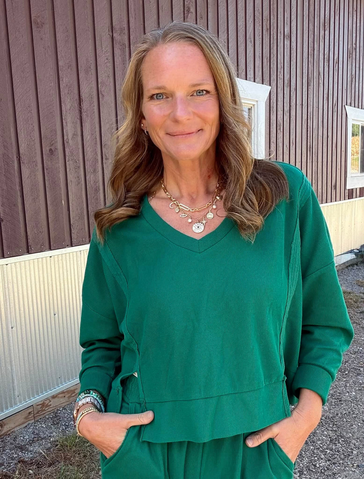 Lifestyle view 4 of the LuLaRoe Wendy Easy Barrel Pull-On Pant in Solid Emerald Green