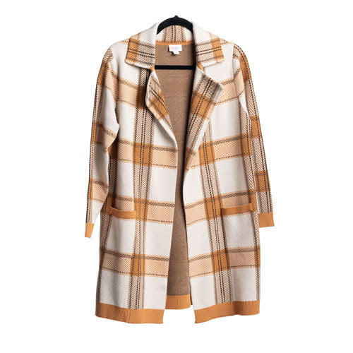 Cream and honey plaid Laura lapel open cardigan with windowpane pattern and front patch pockets on hanger on a white background