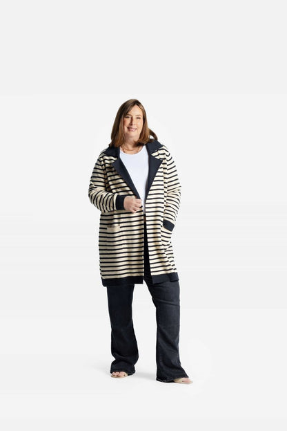 Model wearing a cream and black Refined Breton Stripe Laura lapel open cardigan with pockets on a white background