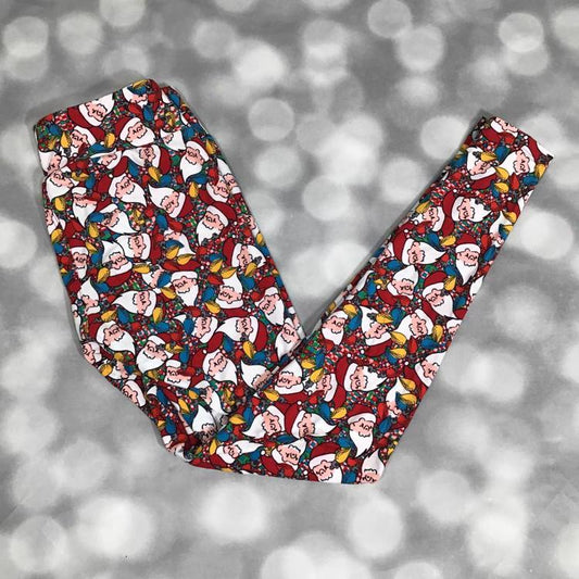 LuLaRoe red leggings with Santa faces and colorful holiday light print in buttery-soft Brushed DTY fabric