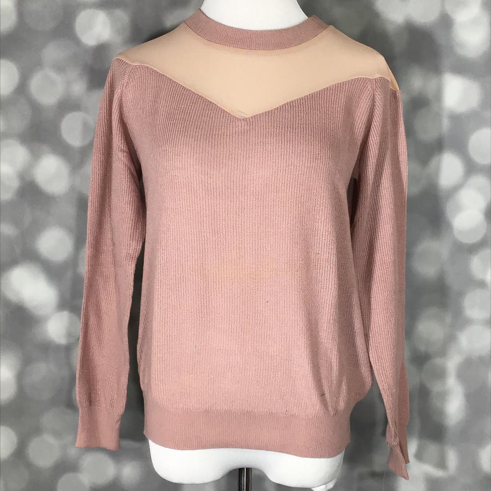 LuLaRoe Lizzy Sweater in blush pink with mesh yoke detail, ribbed neckline, cuffs, and bottom band on a mannequin with a blurred gray background