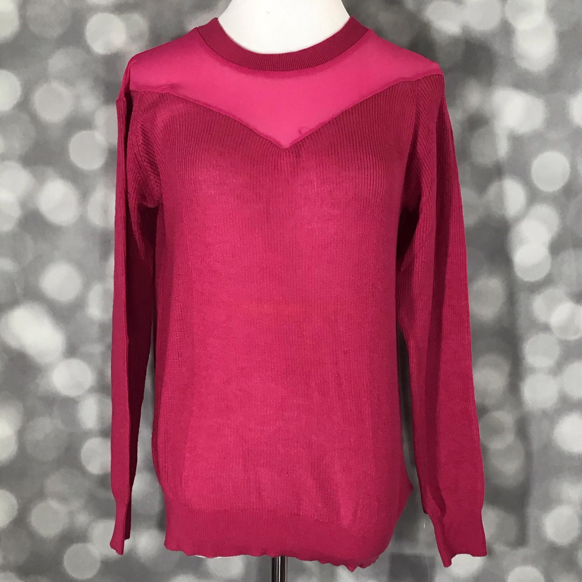 LuLaRoe Lizzy Sweater in solid fuchsia with matching mesh yoke, ribbed trim, and lightweight sweater knit fabric