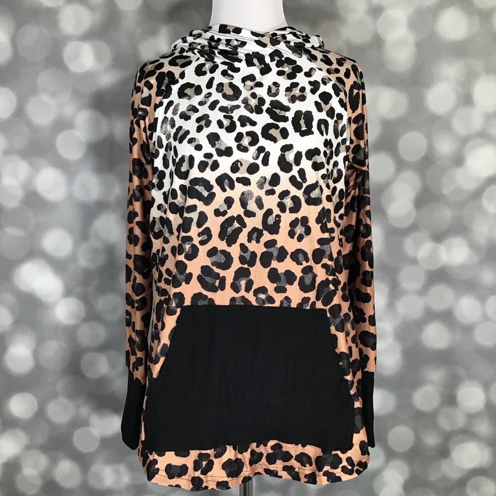 LuLaRoe Amber hoodie featuring tan and black leopard print with solid black colorblock kangaroo pocket and long sleeves on mannequin
