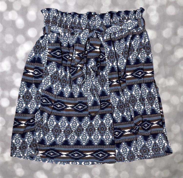 LuLaRoe paperbag shorts with tribal-inspired geometric pattern in blue, brown, and white