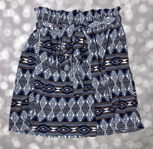 LuLaRoe paperbag shorts with tribal-inspired geometric pattern in blue, brown, and white