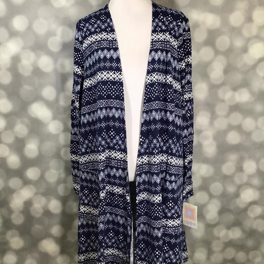LuLaRoe Caroline Cardigan in navy blue with white fair isle print, mid-thigh length with pockets, cozy layering piece.