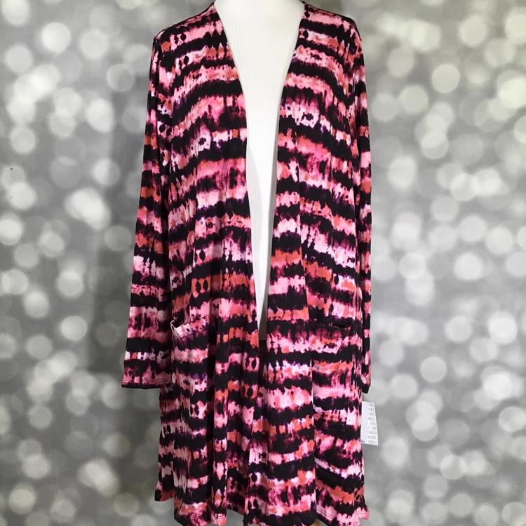 LuLaRoe Caroline cardigan in vibrant pink, black, and red tie-dye stripe print with pockets and mid-thigh length.