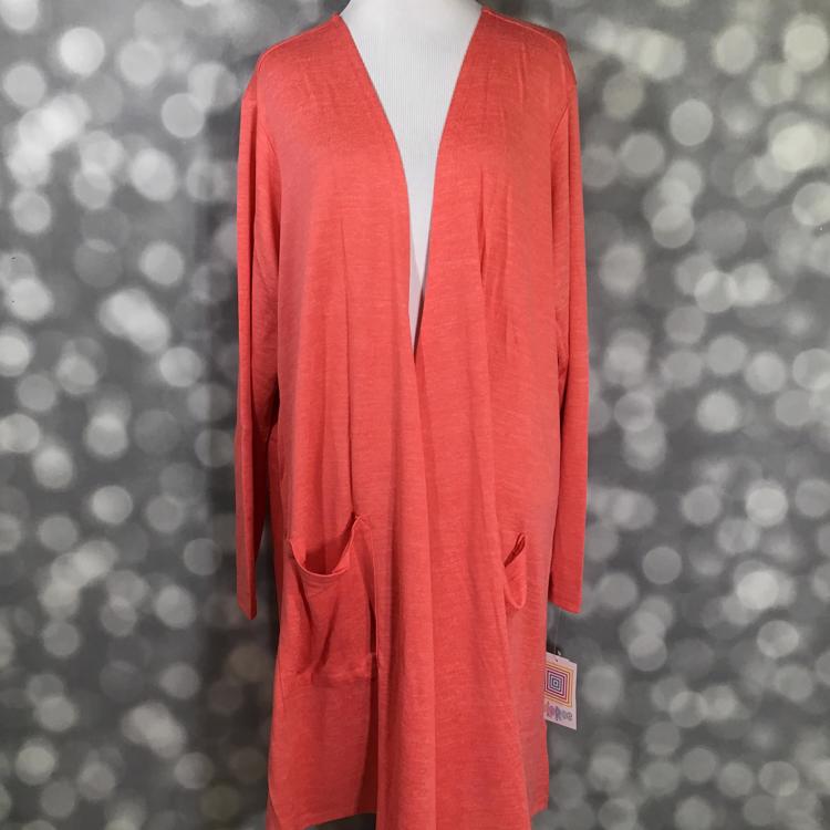 LuLaRoe Caroline Cardigan in solid coral, mid-thigh length with pockets, soft lightweight layering cardigan.