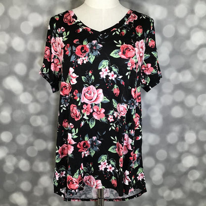 LuLaRoe Christy T in Black, Coral & Dusty Blue Rose Floral, featuring coral and blush roses, dusty blue flowers and green leaves on black, a flattering V-neckline, short sleeves and a relaxed fit.
