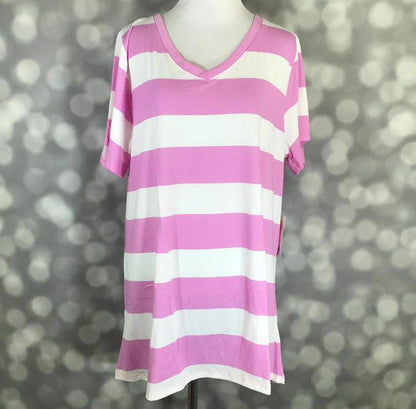 Pink and white striped LuLaRoe Christy T featuring bold horizontal bubblegum pink stripes, short sleeves, and a V-neckline displayed on a mannequin against a silver bokeh background.