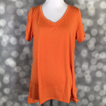 LuLaRoe Christy T in Solid Tangerine Orange, featuring a saturated tangerine-orange color, a flattering V-neckline, short sleeves and a relaxed fit.