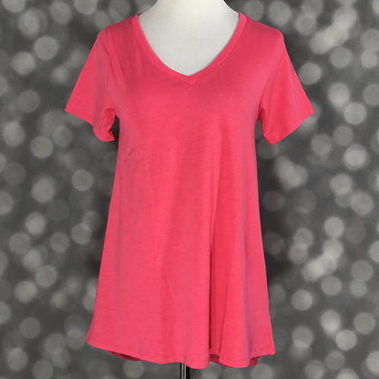 LuLaRoe Christy T in Solid Watermelon Pink, featuring a warm watermelon-pink color, a flattering V-neckline, short sleeves and a relaxed fit.