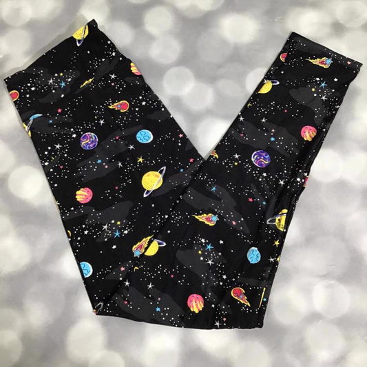 LuLaRoe leggings with bright outer space pattern featuring planets, stars, and rockets on a black background