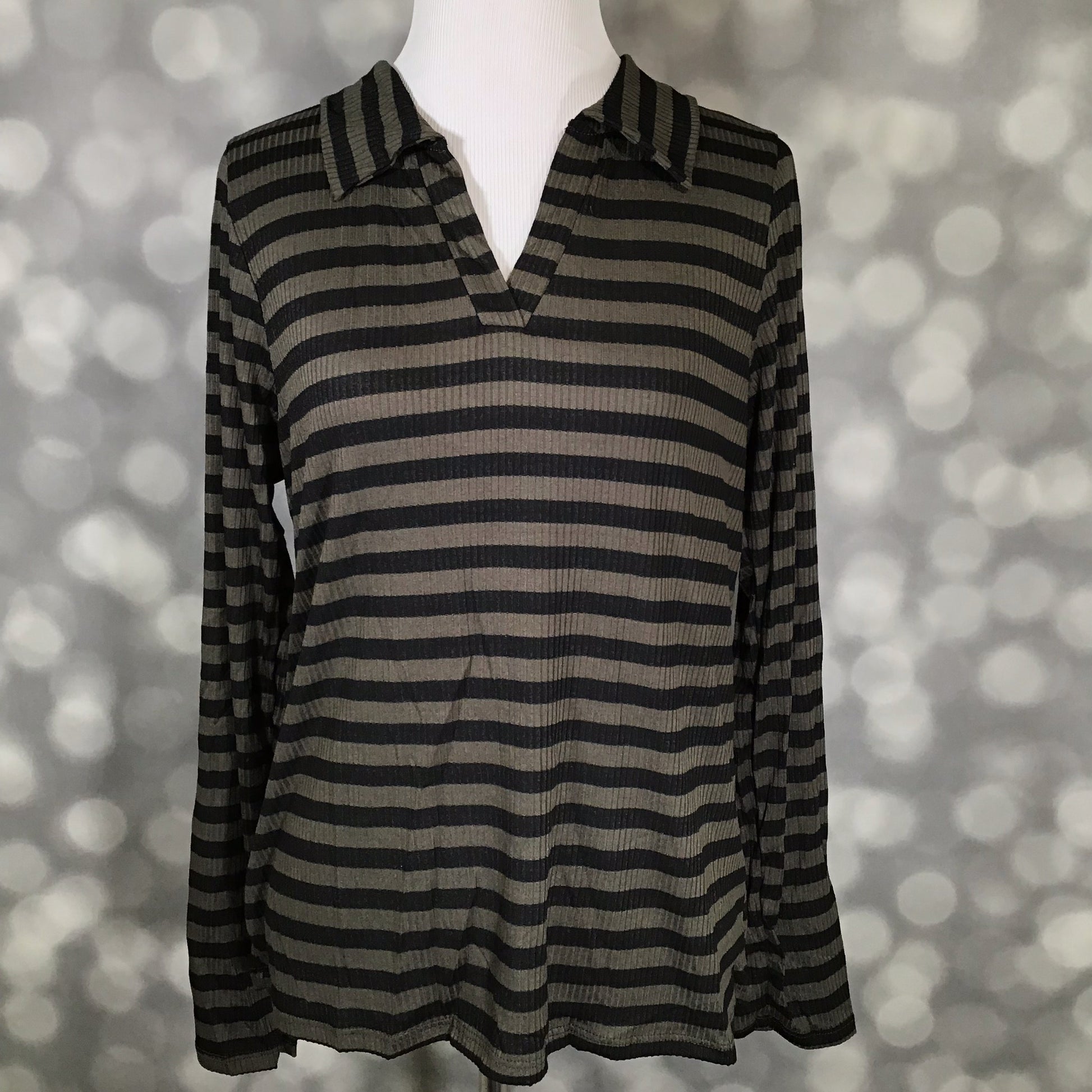 LuLaRoe Courtney Long Sleeve Polo Top in black and olive horizontal stripes displayed on a mannequin. Features a soft 4x2 rib knit, collared V-neckline, and long sleeves.