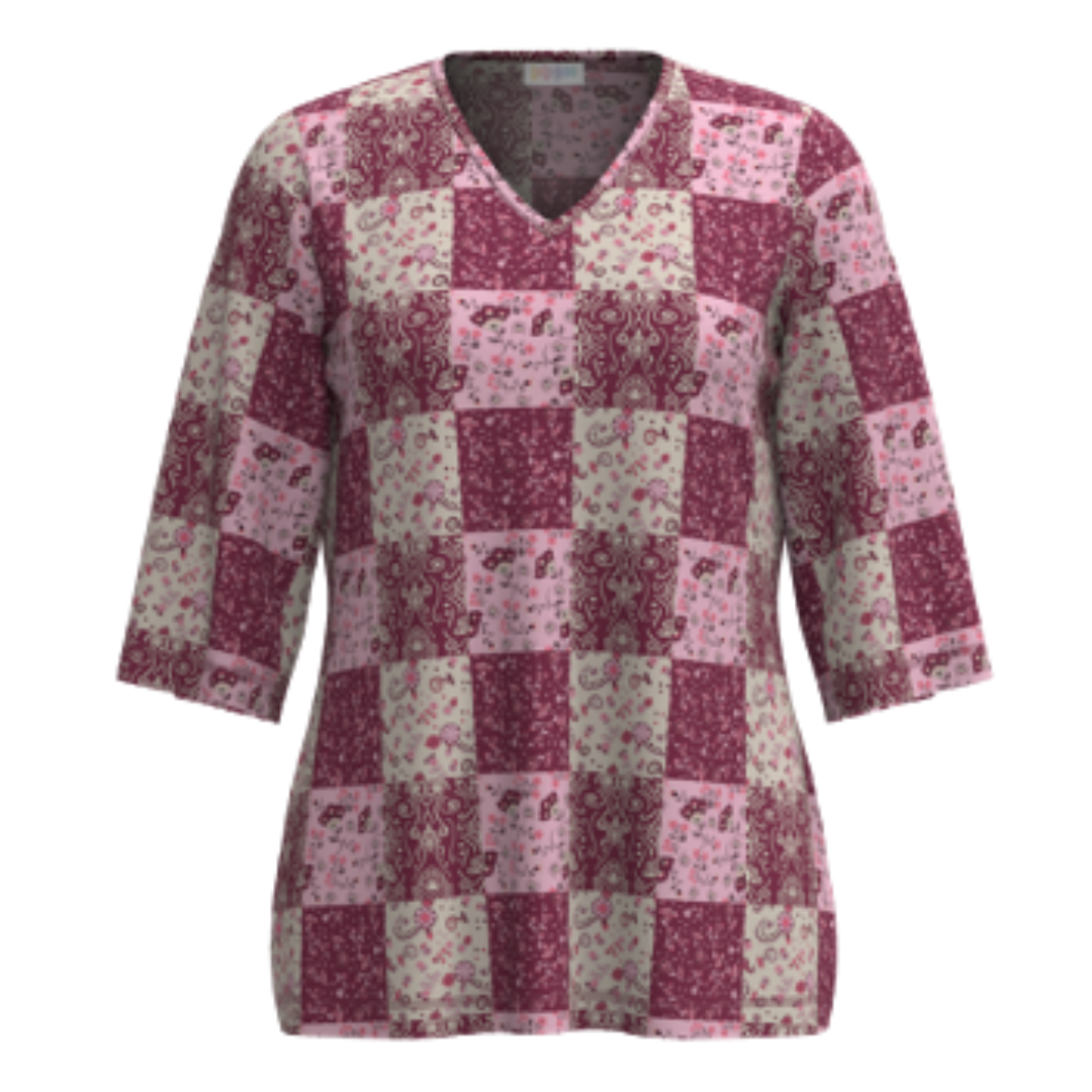 LuLaRoe Eden Top with pink and mauve patchwork floral print featuring mixed vintage-inspired patterns and V-neck with 3/4 sleeves on a white background