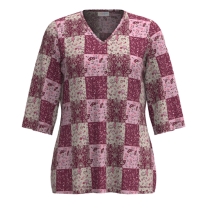LuLaRoe Eden Top with pink and mauve patchwork floral print featuring mixed vintage-inspired patterns and V-neck with 3/4 sleeves on a white background