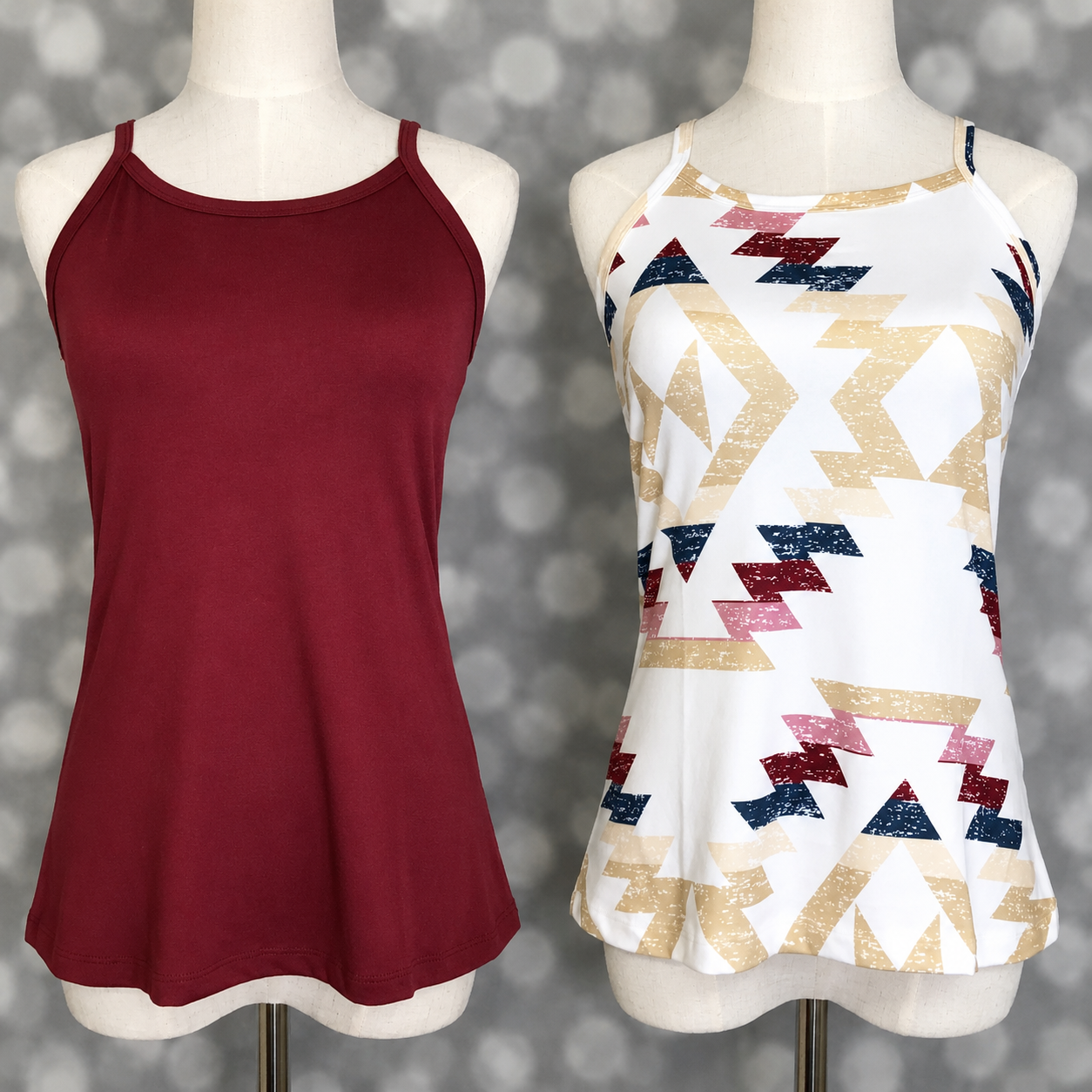 Two LuLaRoe Essential camis shown on mannequins featuring a solid cranberry red camisole paired with a white southwestern geometric print cami in tan, navy, blush pink, and burgundy tones on a soft gray backdrop.