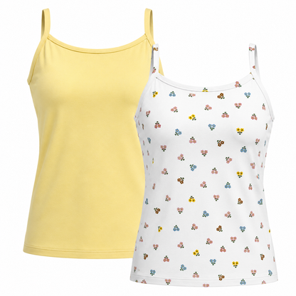Two LuLaRoe Essential Camis displayed on a light gray background featuring one solid butter yellow cami and one white cami with tiny scattered pink, blue, yellow, and brown floral prints in a delicate wildflower pattern.
