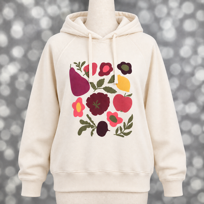 Women’s LuLaRoe Graphic Hoodie in soft ivory with a multicolor fruit and floral design, shown on a mannequin.