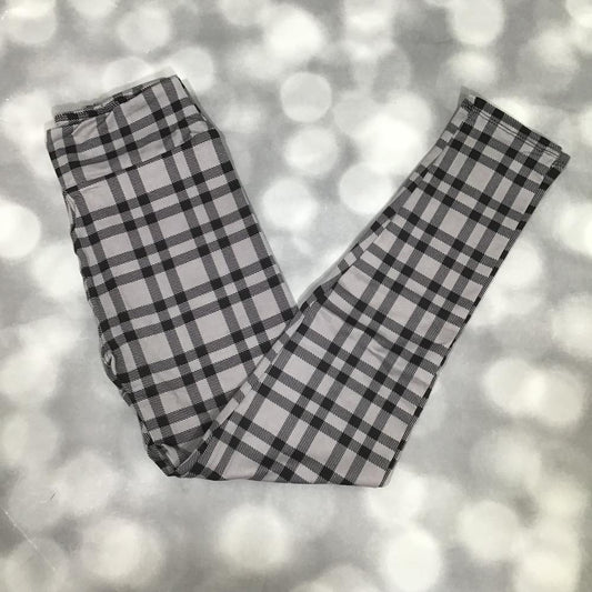 LuLaRoe leggings in a timeless gray and black plaid pattern on a light gray background. Classic heritage style for versatile everyday wear.

