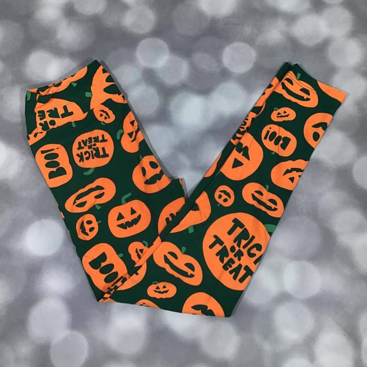 LuLaRoe Halloween leggings with green background and orange pumpkin and Halloween text print.