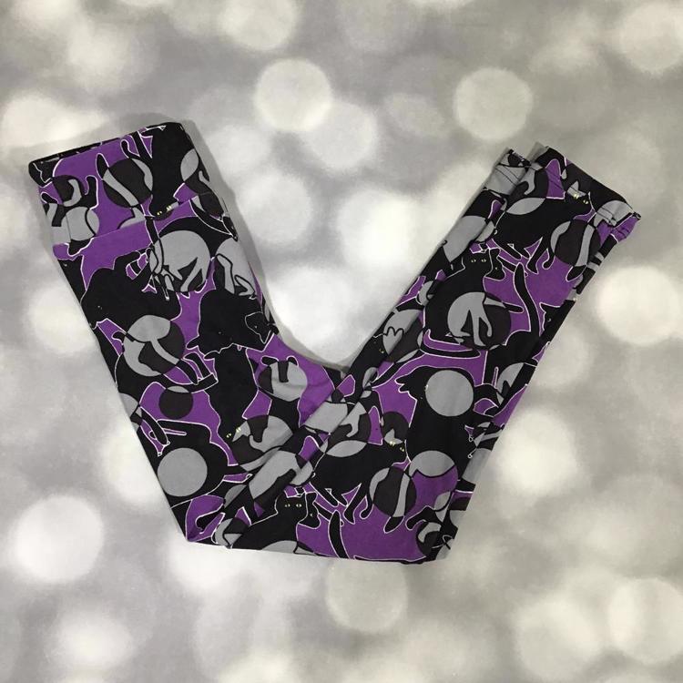 LuLaRoe Halloween leggings in purple and black featuring spooky black cats with glowing yellow eyes and gray moon details.