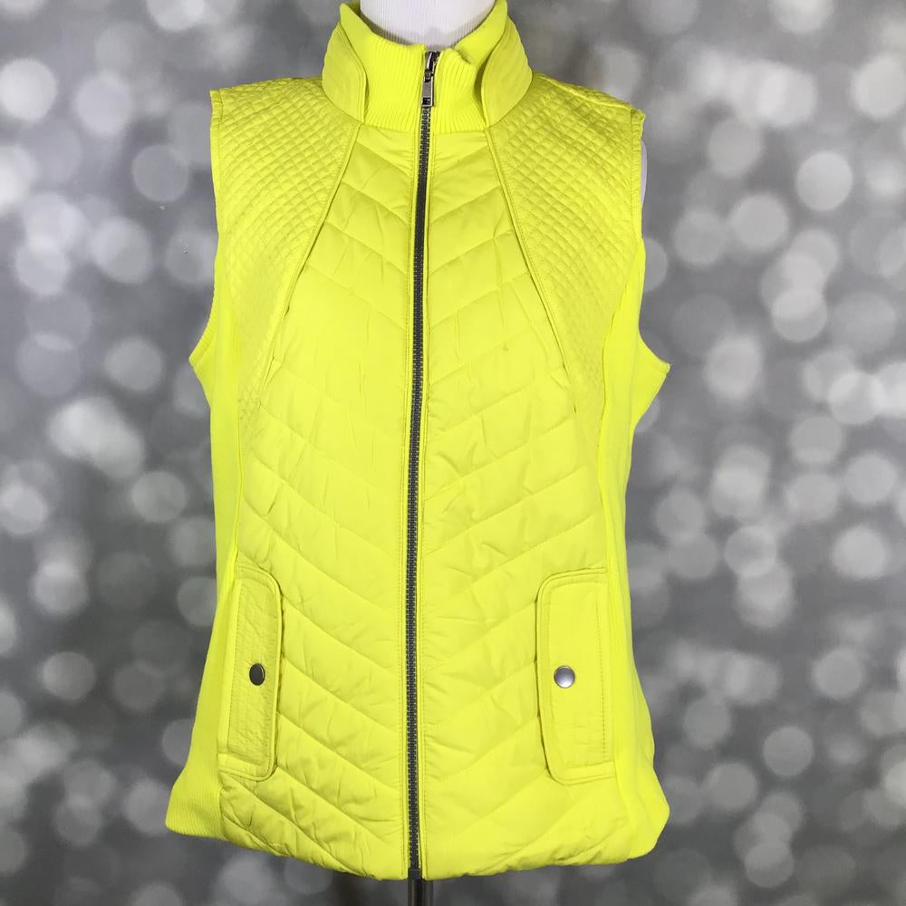 LuLaRoe Hunter zip-up vest in bright neon citron yellow with chevron quilted front, diamond quilted shoulders, ribbed collar, zipper closure, and snap pocket details displayed on a mannequin against a blurred gray background