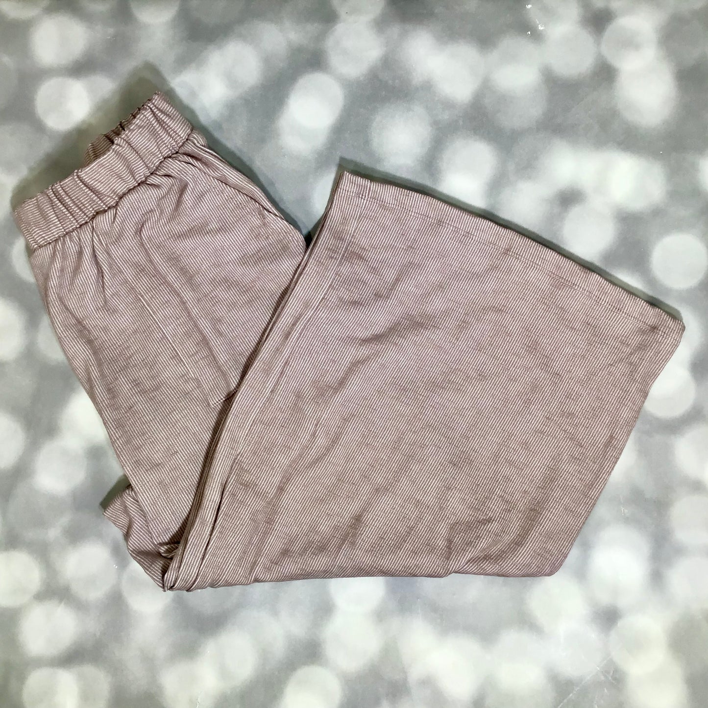 LuLaRoe Justine Pant in Solid Dusty Rosewood featuring a soft dusty mauve taupe solid color, relaxed wide leg silhouette, elastic waistband, comfortable everyday women's fashion pant.