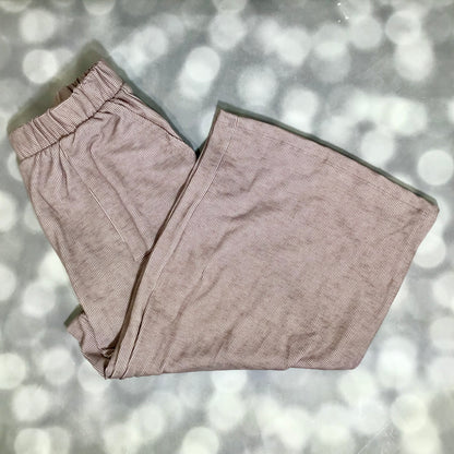 LuLaRoe Justine Pant in Solid Dusty Rosewood featuring a soft dusty mauve taupe solid color, relaxed wide leg silhouette, elastic waistband, comfortable everyday women's fashion pant.