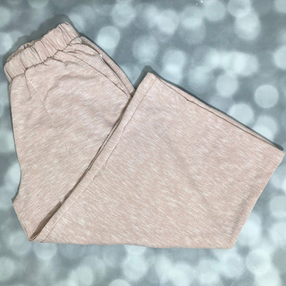 LuLaRoe Justine Pant in Solid Sandstone Beige featuring a soft warm beige solid color, relaxed wide leg silhouette, elastic waistband, and comfortable pull-on styling for everyday wear.