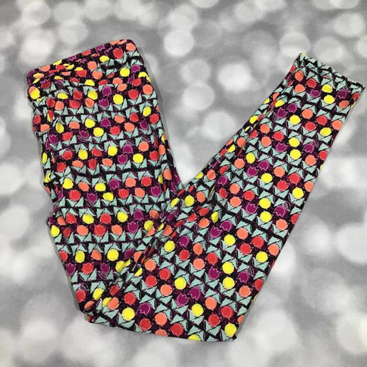 LuLaRoe leggings in black with vibrant tulip floral print in yellow, coral, and plum – buttery-soft comfort