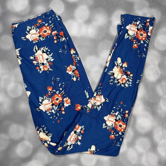 LuLaRoe leggings in midnight blue with red and ivory rose floral print – buttery-soft fabric