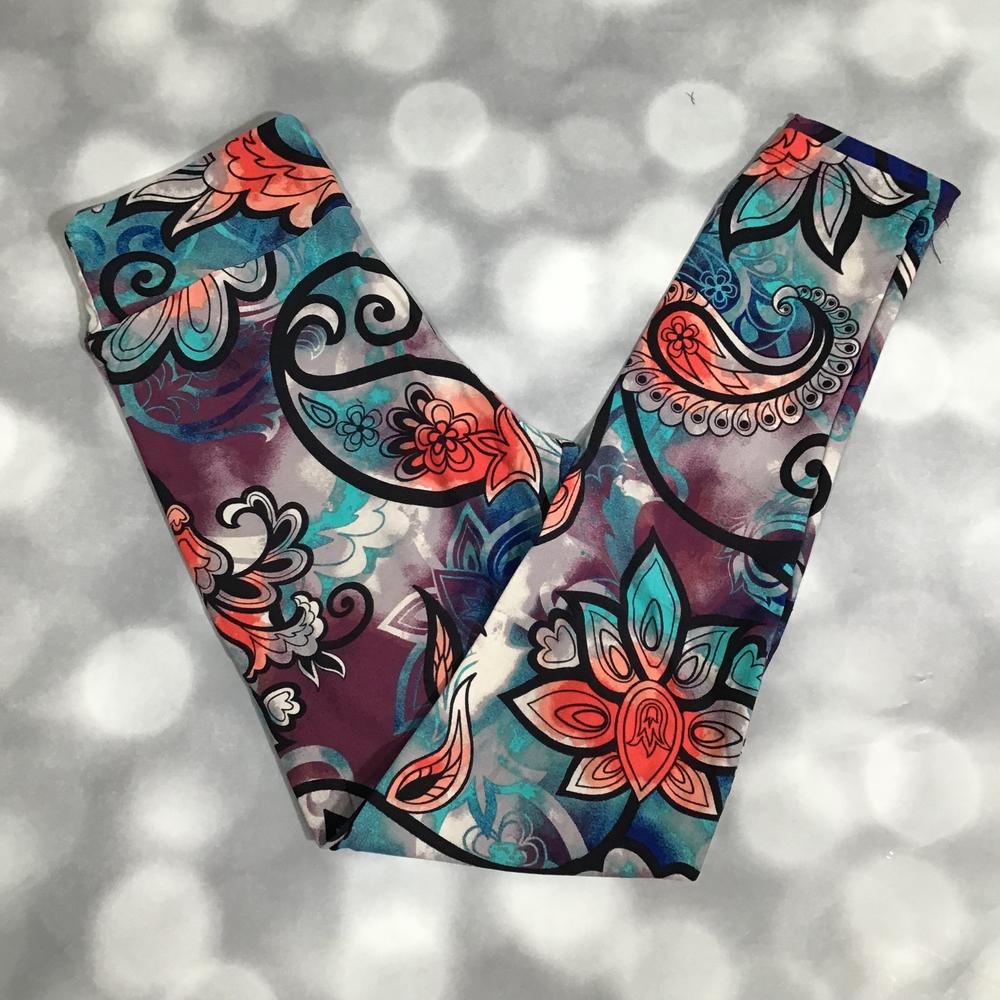 LuLaRoe leggings featuring a multicolor bohemian floral and paisley-inspired pattern with teal, coral, plum, and ivory tones in an all-over artistic design