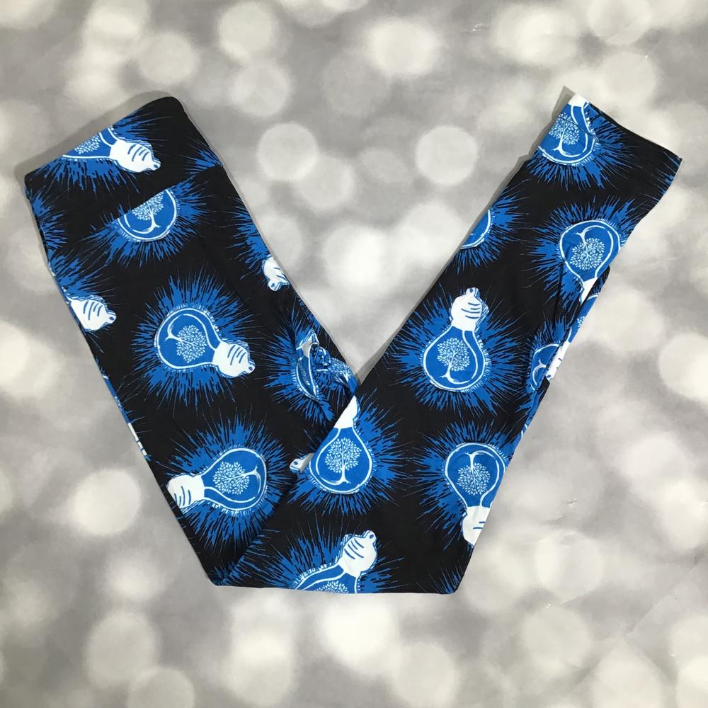 LuLaRoe leggings in Bright Idea with black background, electric blue lightbulb icons, and soft stretchy fabric on a dark background