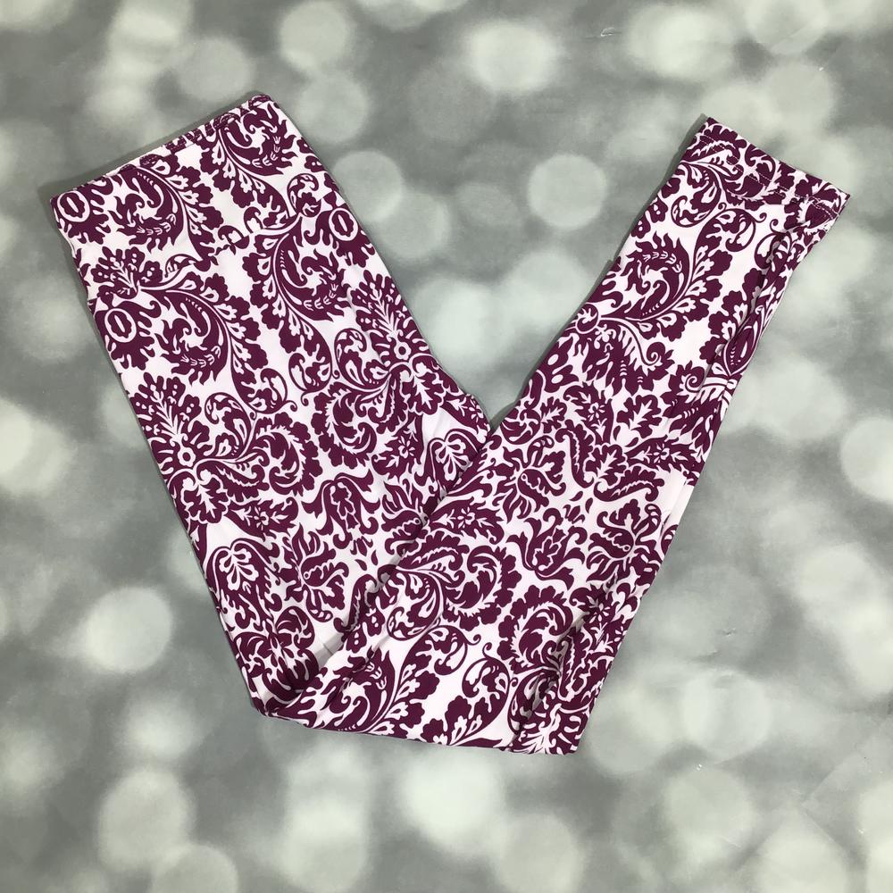 LuLaRoe leggings featuring white background with deep berry red damask scroll print on a gray background