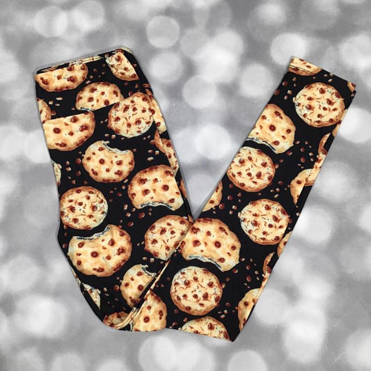 LuLaRoe leggings featuring a fun all-over chocolate chip cookie print on a black background