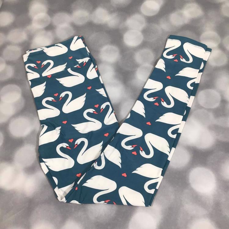 LuLaRoe leggings teal swan print with white swans and coral hearts romantic animal pattern
