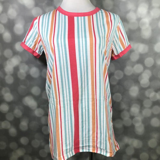 LuLaRoe Liv T in multicolor vertical stripes of coral, aqua, orange, and white with coral trim” | “Front view of LuLaRoe Liv T on mannequin featuring bright coral, aqua, orange, and white vertical stripe pattern with solid coral collar and sleeve trim against a blurred background