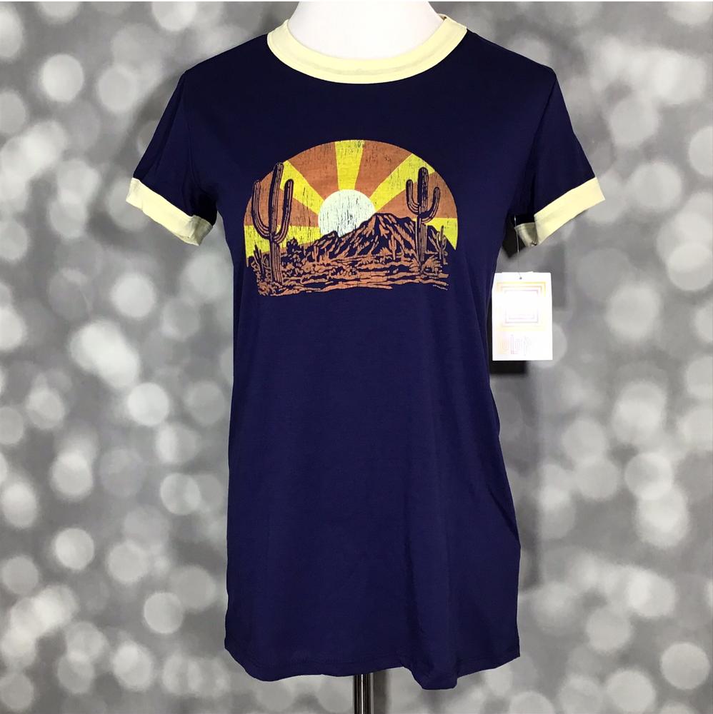 LuLaRoe Liv Tee navy shirt with desert sunset graphic featuring mountains, cacti, and sun rays with yellow trim