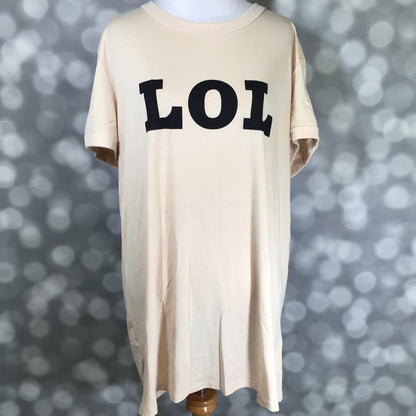 LuLaRoe Liv Tee cream shirt with 'LOL' graphic text in black printed on it against a blurred background