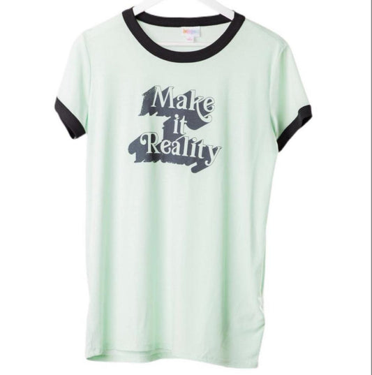 LuLaRoe Liv Tee in mint green with black trim and “Make It Reality” graphic text, featuring short sleeves, relaxed fit, and curved hem displayed on a hanger on a white background