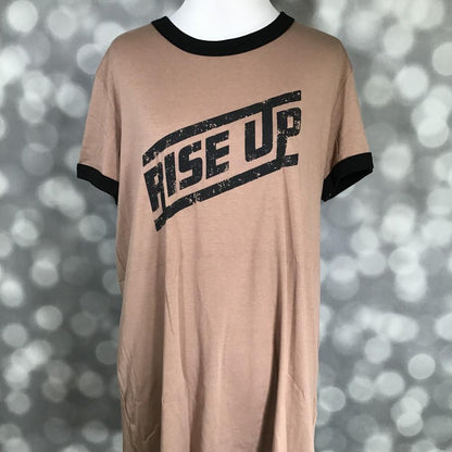 LuLaRoe Liv Tee tan shirt with 'RISE UP' graphic text and black trim on a blurred background