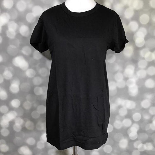 LuLaRoe Liv tee in solid black with short sleeves and crew neckline, relaxed fit basic everyday top displayed on mannequin