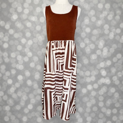 LuLaRoe Madeline Midi Tank Dress with a mocha brown tank bodice and ivory skirt featuring a bold mocha geometric maze print.