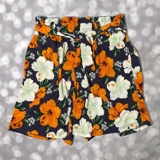 LuLaRoe paperbag shorts in navy with vibrant orange and white hibiscus floral print