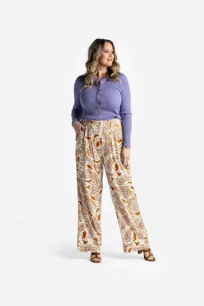 LuLaRoe Pamela Trouser in cream with golden botanical floral line print, wide leg flowy pants styled with lavender cardigan
