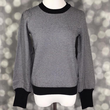 LuLaRoe Piper Sweater in black and ivory micro stripe knit with solid black ribbed neckline, hem, and extended cuffs and balloon sleeves displayed on mannequin against gray background.