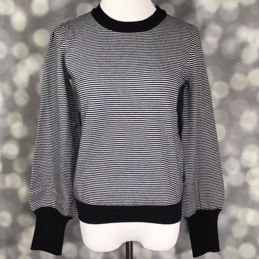 LuLaRoe Piper Sweater in black and ivory micro stripe knit with solid black ribbed neckline, hem, and extended cuffs and balloon sleeves displayed on mannequin against gray background.